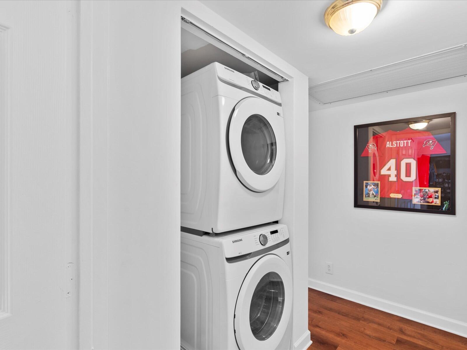 4025 Village Drive, Unit C Delray Beach, FL 33445 - Photo 28 of 32 a utility room with dryer and washer