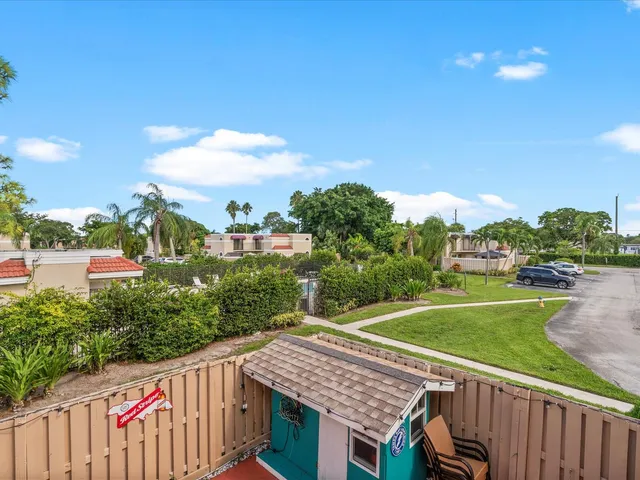 an aerial view of a house with a garden
