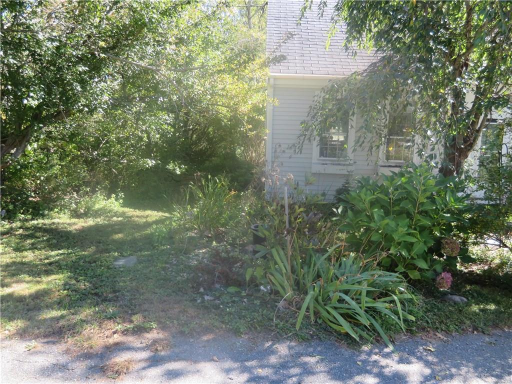 17 Storer Road Bremen, ME 04551 - Photo 5 of 18 Here's a pathway through the shrubs...