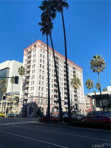 a view of balcony with potted plants