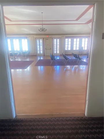 a view of livingroom with furniture and floor to ceiling window