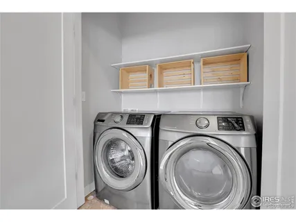 a view of washer and dryer in a utility room
