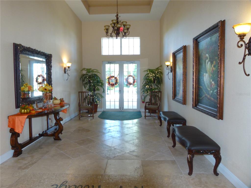537 Southwest 40th Cove, Unit 73 Okeechobee, FL 34974 - Photo 15 of 23 a living room with furniture and a window