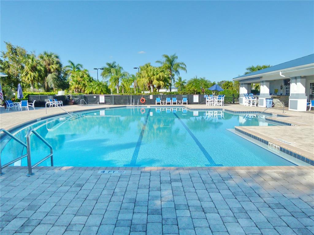 537 Southwest 40th Cove, Unit 73 Okeechobee, FL 34974 - Photo 22 of 23 a view of a swimming pool and outdoor space