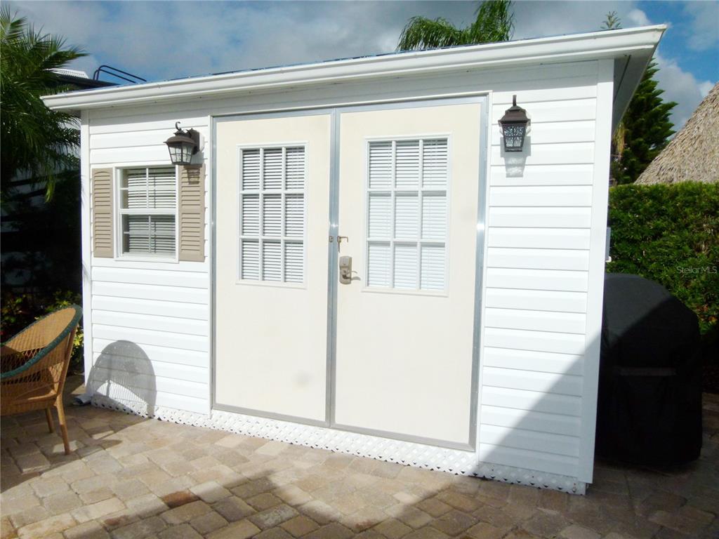 537 Southwest 40th Cove, Unit 73 Okeechobee, FL 34974 - Photo 4 of 23 a view of a house with a lounge chair