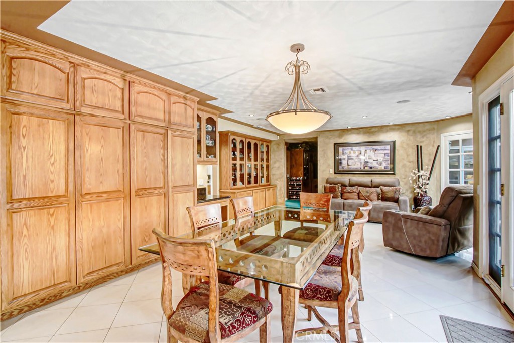 7954 Thoroughbred Street Rancho Cucamonga, CA 91701 - Photo 24 of 63 a view of a livingroom with furniture and window