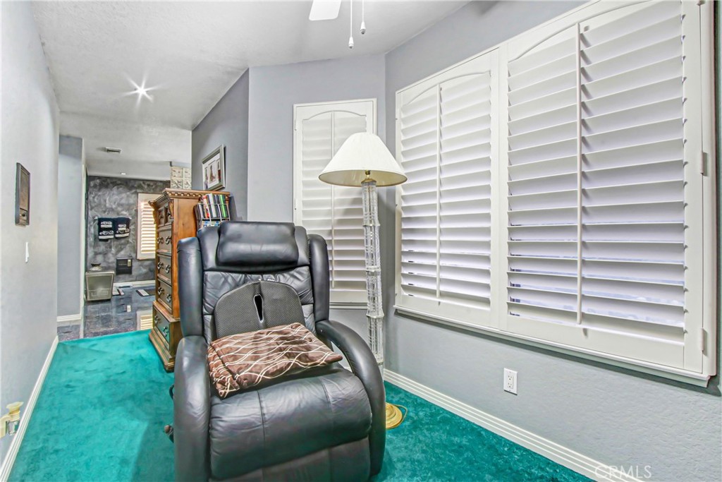 7954 Thoroughbred Street Rancho Cucamonga, CA 91701 - Photo 37 of 63 a room with furniture and a window