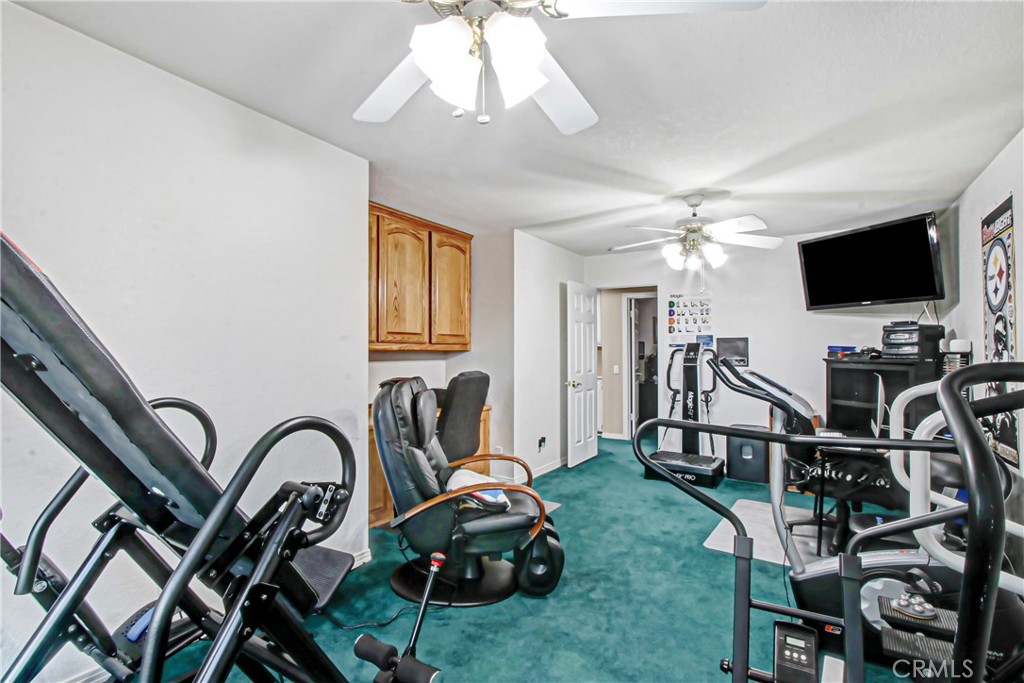 7954 Thoroughbred Street Rancho Cucamonga, CA 91701 - Photo 41 of 63 a view of a room with gym equipment