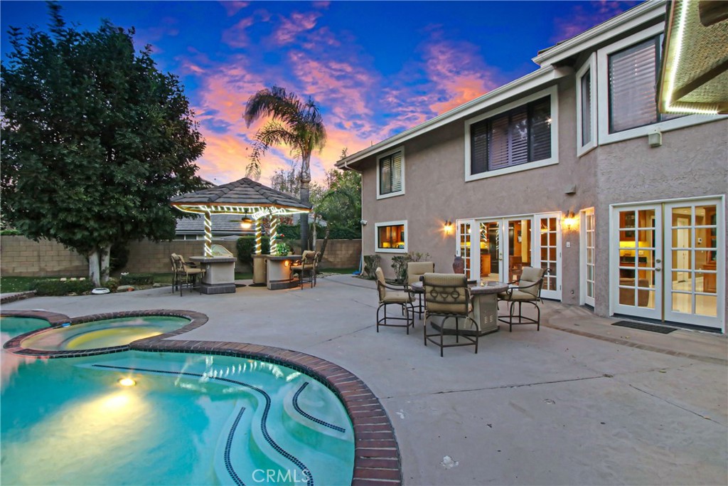 7954 Thoroughbred Street Rancho Cucamonga, CA 91701 - Photo 54 of 63 a view of a swimming pool with sitting area