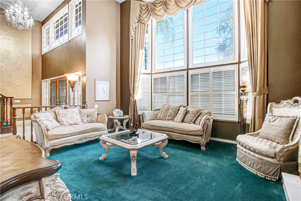 7954 Thoroughbred Street Rancho Cucamonga, CA 91701 - Photo 6 of 63 a living room with furniture and a large window