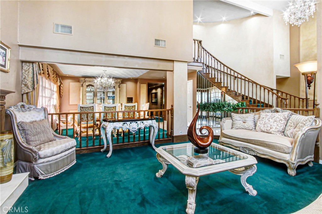 7954 Thoroughbred Street Rancho Cucamonga, CA 91701 - Photo 7 of 63 a living room with furniture a table and a potted plant