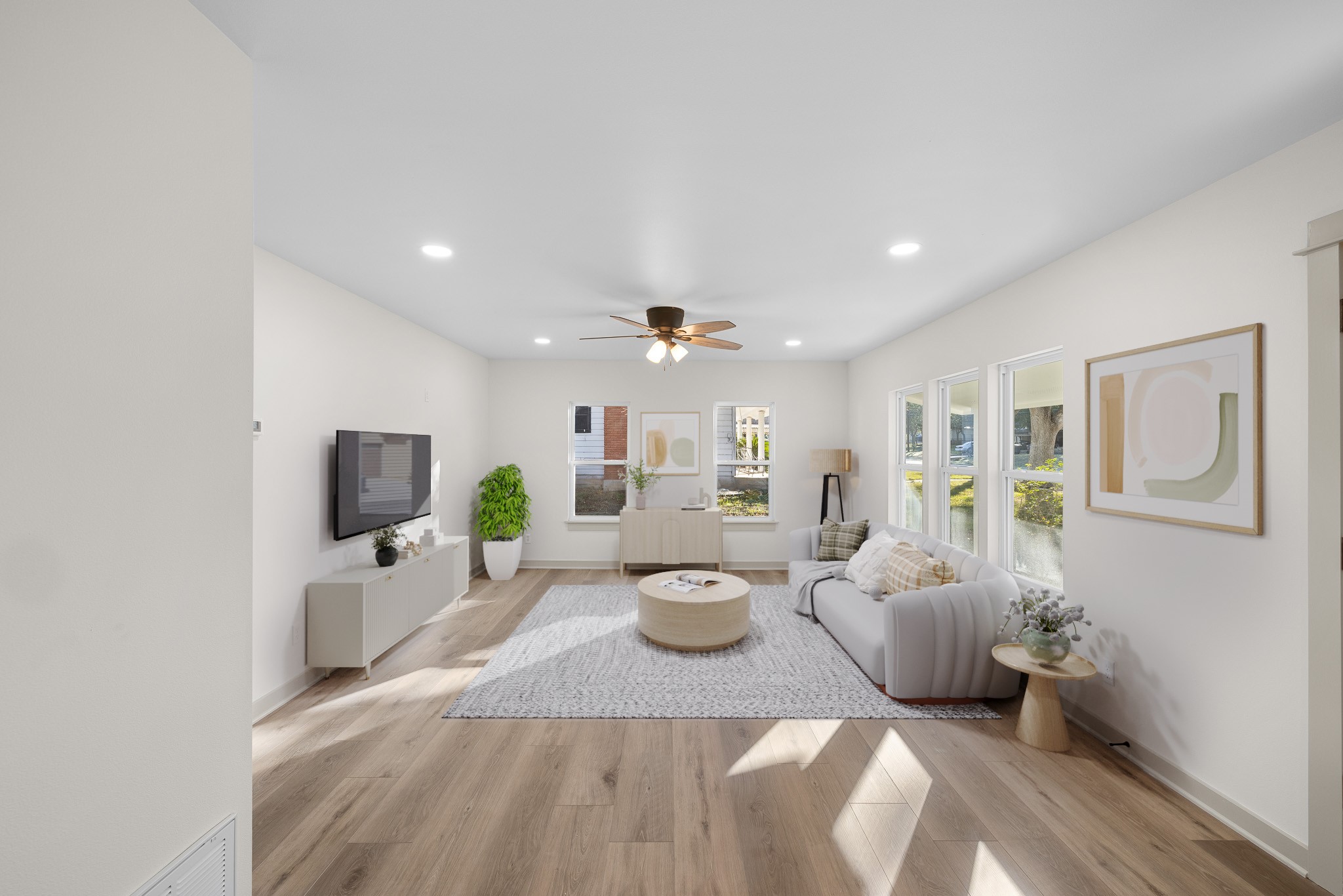 911 Eilers Street Schulenburg, TX 78956 - Photo 5 of 22 a living room with fireplace furniture and a flat screen tv