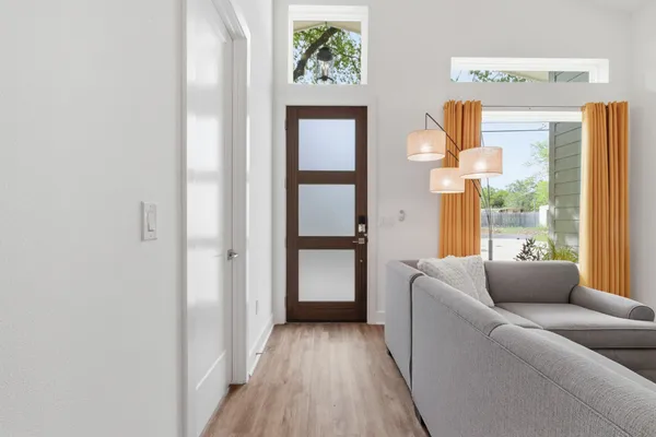 a living room with furniture and a window
