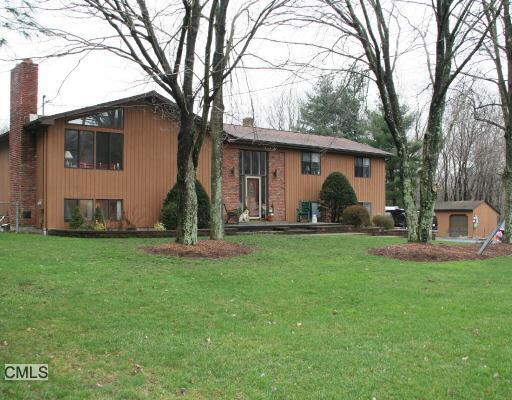 105 Longmeadow Road Shelton, CT 06484 - Photo 1 of 1 a view of a house with backyard and a tree