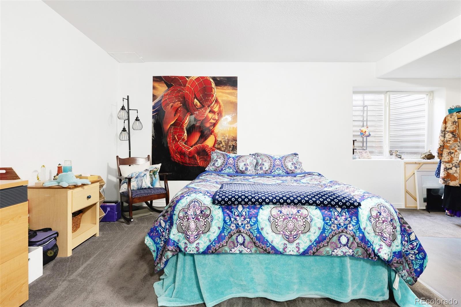 5308 Stuart Street Denver, CO 80212 - Photo 23 of 33 a bedroom with a bed and window