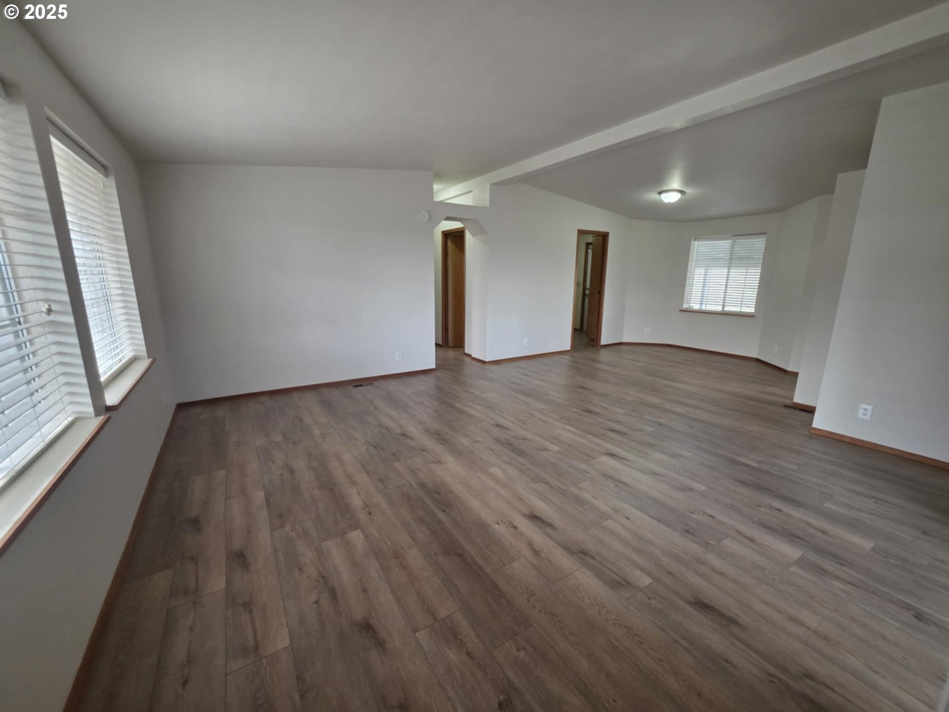 1402 Pioneer Way Forest Grove, OR 97116 - Photo 18 of 26 wooden floor in an empty room with a window