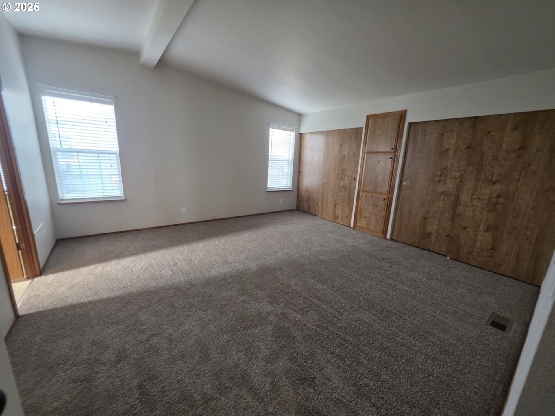 1402 Pioneer Way Forest Grove, OR 97116 - Photo 21 of 26 an empty room with windows