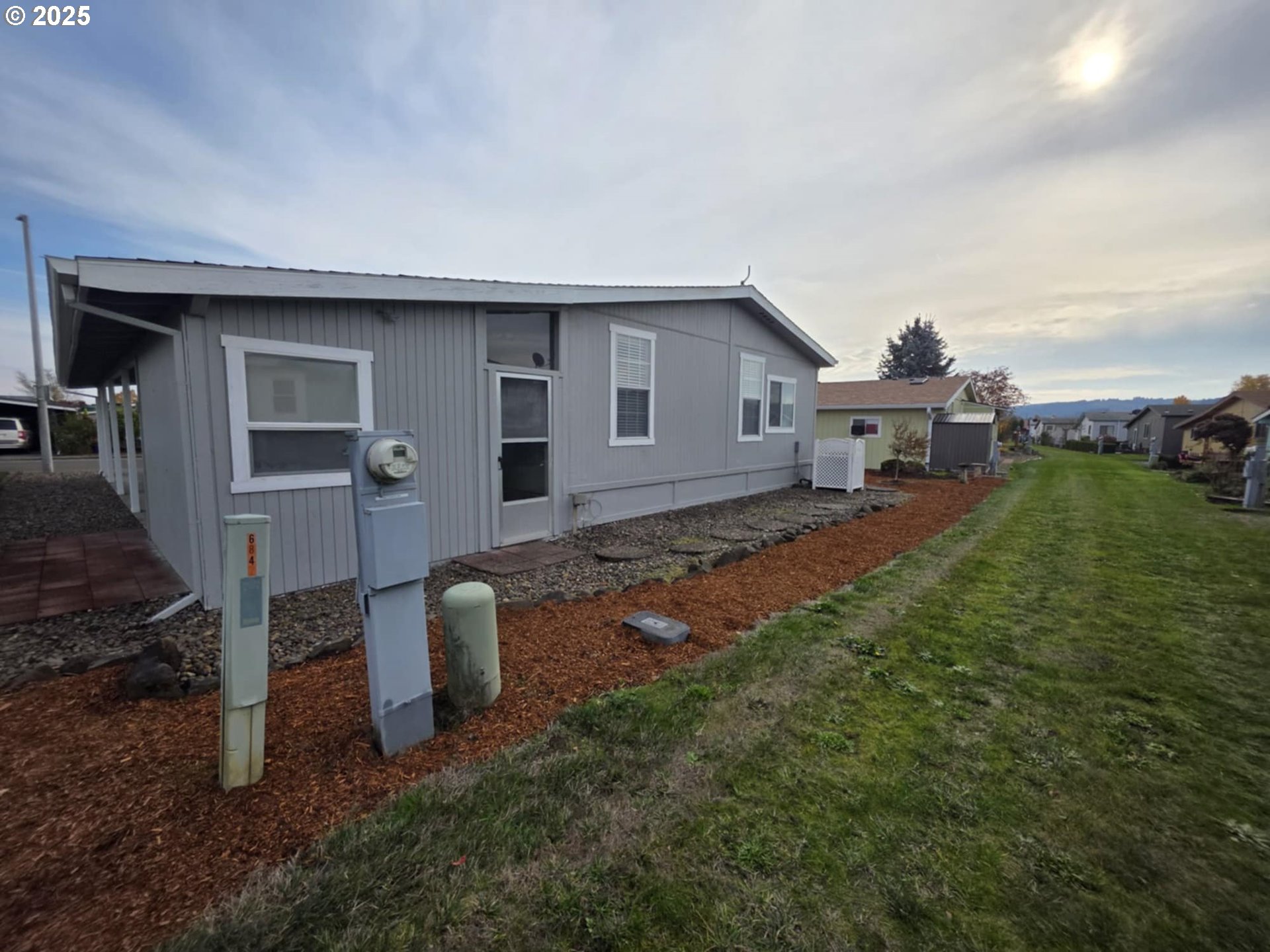 1402 Pioneer Way Forest Grove, OR 97116 - Photo 25 of 26 a house view with a garden space