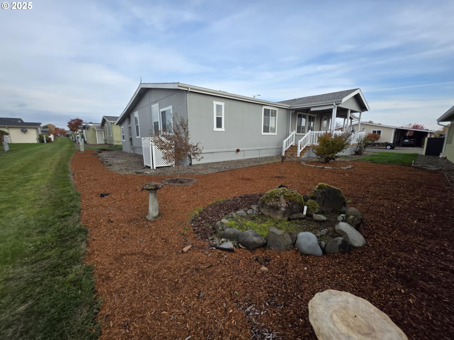 1402 Pioneer Way Forest Grove, OR 97116 - Photo 26 of 26 a front view of a house with garden