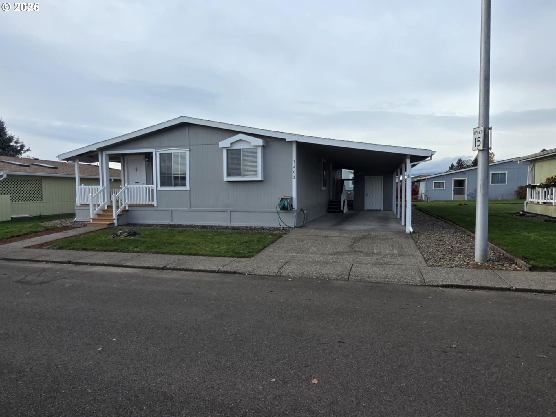 1402 Pioneer Way Forest Grove, OR 97116 - Photo 3 of 26 a house view with a backyard space