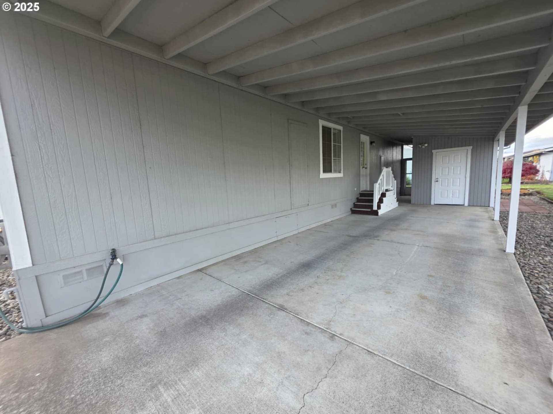 1402 Pioneer Way Forest Grove, OR 97116 - Photo 6 of 26 a view of a livingroom with wooden furniture and roof