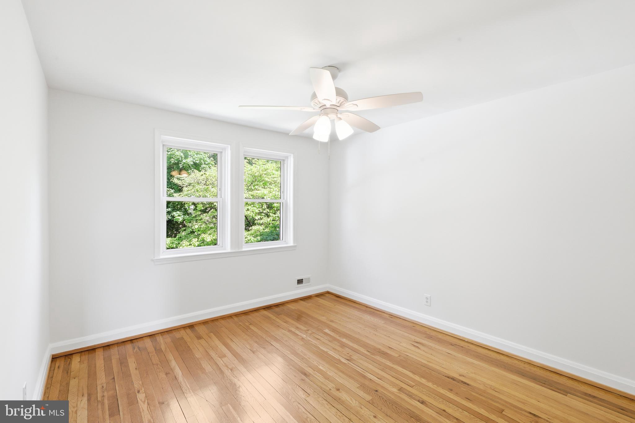 1421 West 41st Street Baltimore, MD 21211 - Photo 11 of 43 Upper 1 - Primary bedroom with updated windows