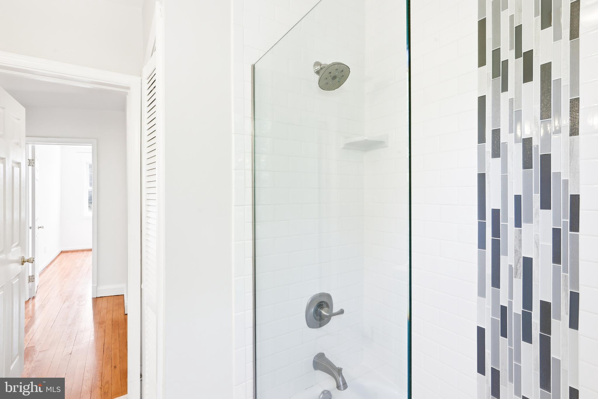 1421 West 41st Street Baltimore, MD 21211 - Photo 13 of 43 Upper 1 - Hall bath shower with glass surround