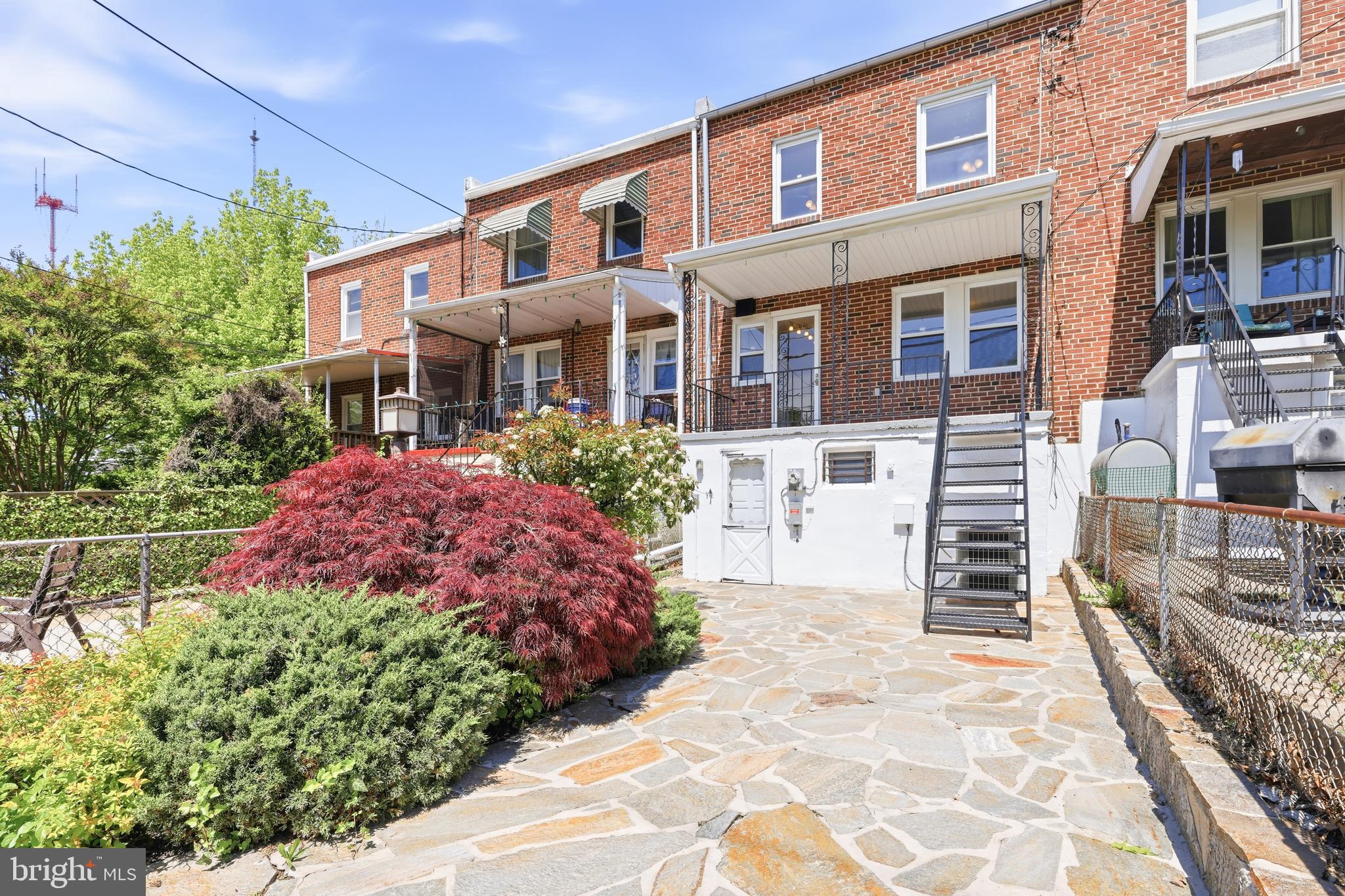 1421 West 41st Street Baltimore, MD 21211 - Photo 22 of 43 Backyard is a beautiful patio with landscaping
