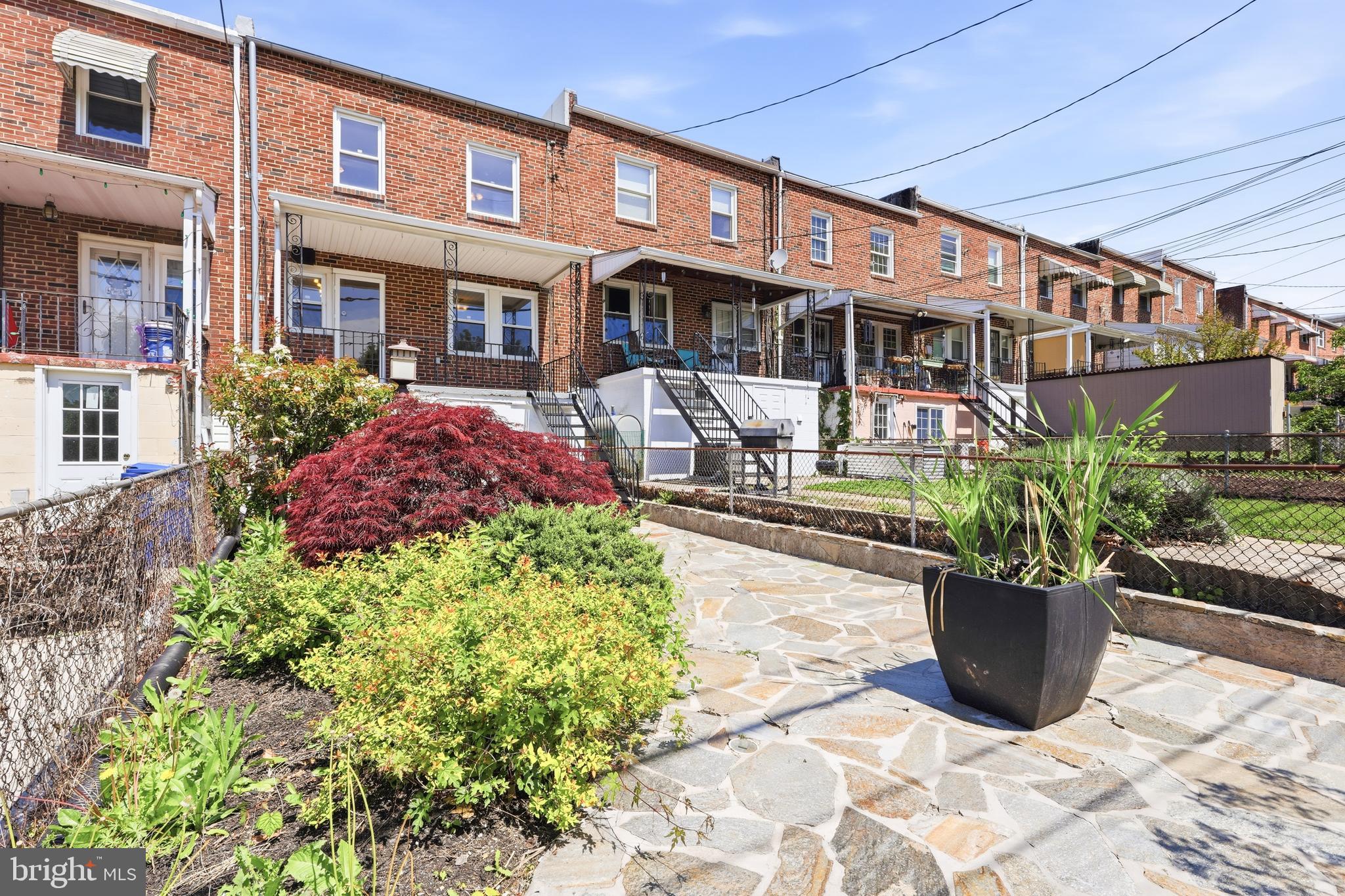 1421 West 41st Street Baltimore, MD 21211 - Photo 23 of 43 Backyard is a beautiful patio with landscaping