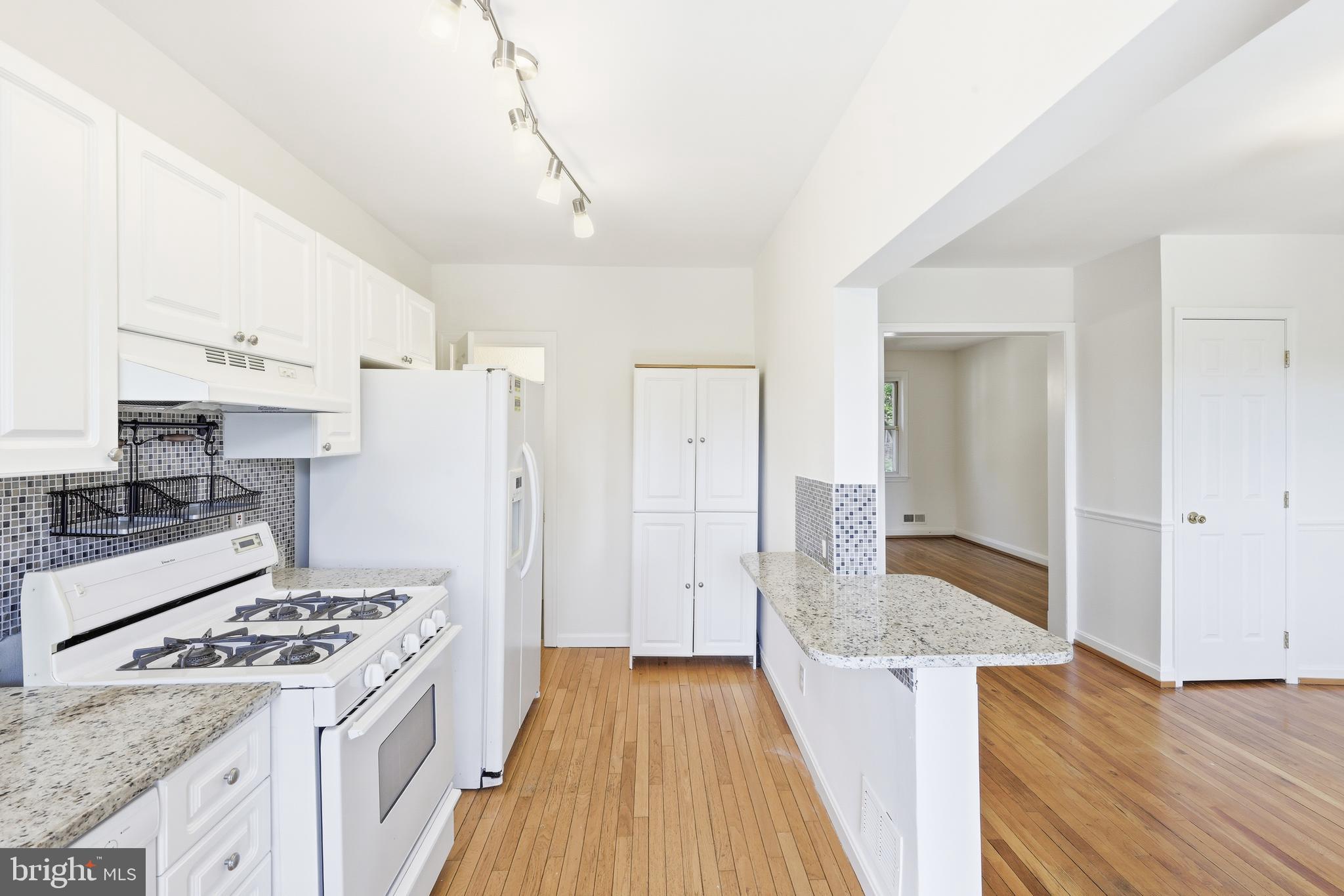 1421 West 41st Street Baltimore, MD 21211 - Photo 9 of 43 Updated kitchen open to DR walks out to back porch