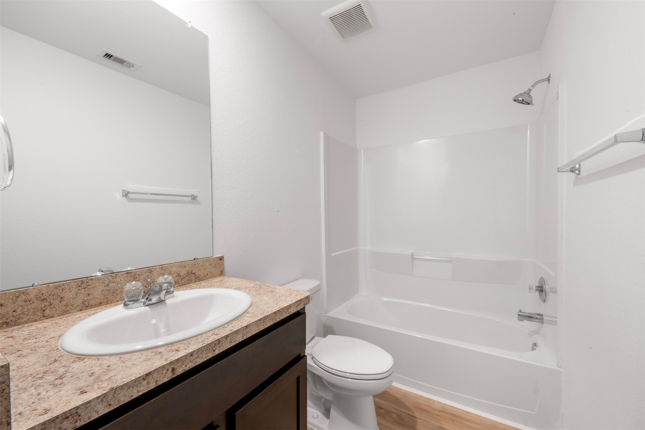 14602 Broadbury Pond Road Rosharon, TX 77583 - Photo 21 of 22 a bathroom with a granite countertop sink toilet and shower