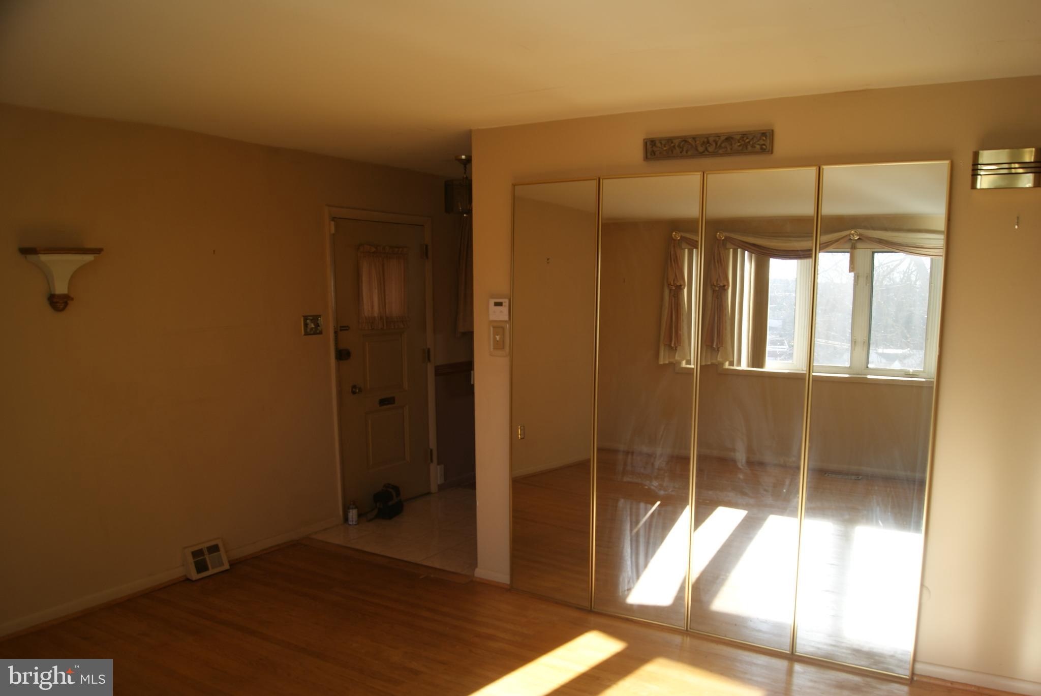 7314 Hill Road Philadelphia, PA 19128 - Photo 12 of 68 a bathroom with a glass shower door