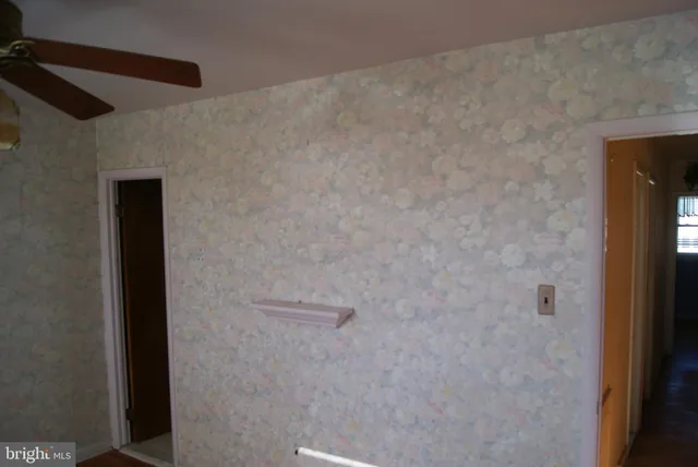 a view of a small space with a fan