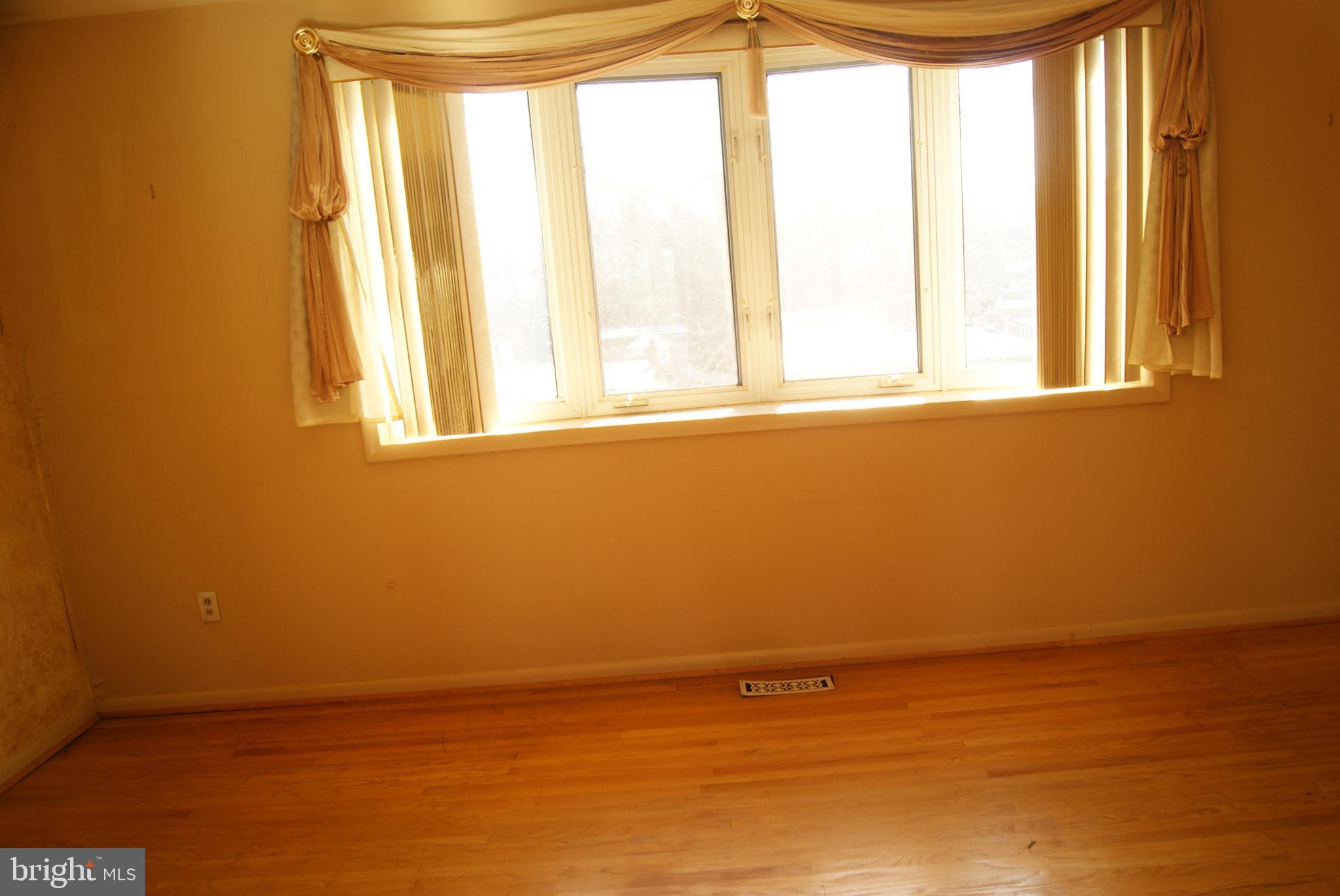 7314 Hill Road Philadelphia, PA 19128 - Photo 25 of 68 a view of an empty room with a window