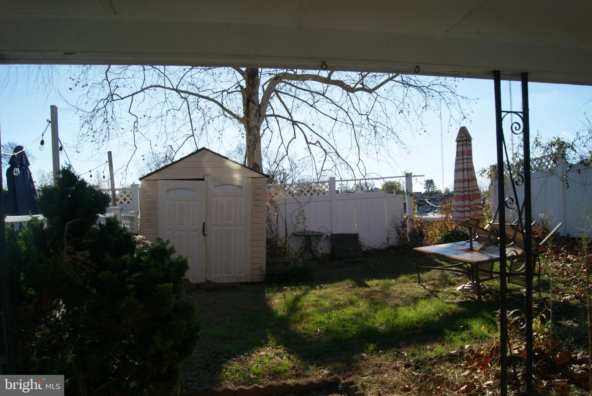 7314 Hill Road Philadelphia, PA 19128 - Photo 32 of 68 a backyard of a house with lots of green space