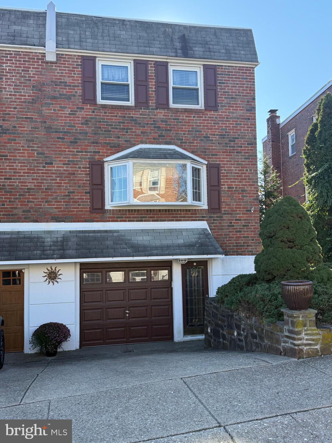 7314 Hill Road Philadelphia, PA 19128 - Photo 39 of 68 a front view of a house with garden