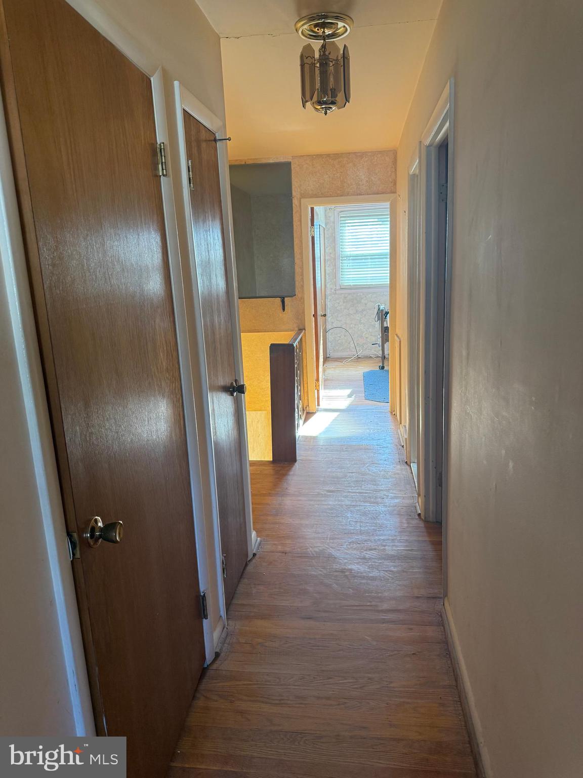 7314 Hill Road Philadelphia, PA 19128 - Photo 40 of 68 a view of a hallway with wooden floor