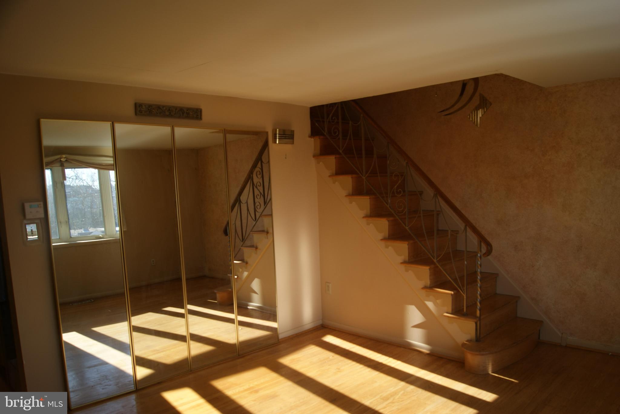 7314 Hill Road Philadelphia, PA 19128 - Photo 10 of 68 a view of entryway and hall with wooden floor