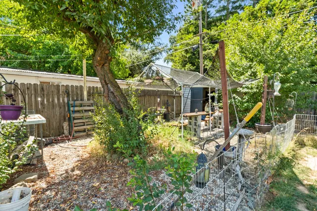 an aerial view of a house with a swimming pool