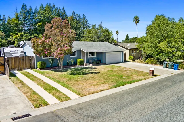 front view of a house with yard