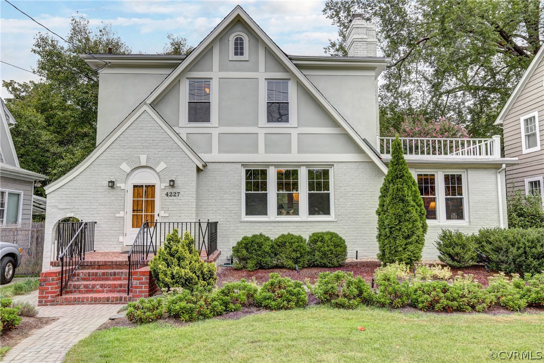 4227 Brook Road Richmond, VA 23227 - Photo 1 of 41 a front view of a house with a yard