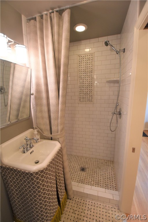 4227 Brook Road Richmond, VA 23227 - Photo 22 of 41 a bathroom with a sink toilet and shower
