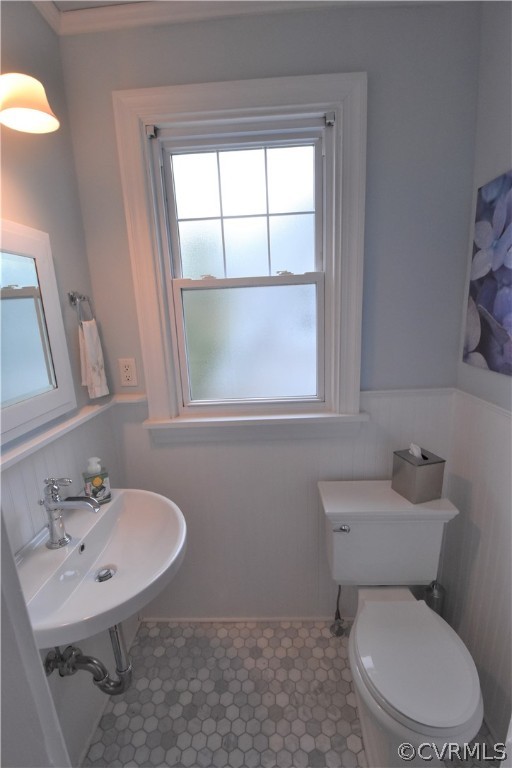 4227 Brook Road Richmond, VA 23227 - Photo 28 of 41 a white toilet sitting next to a bathroom sink