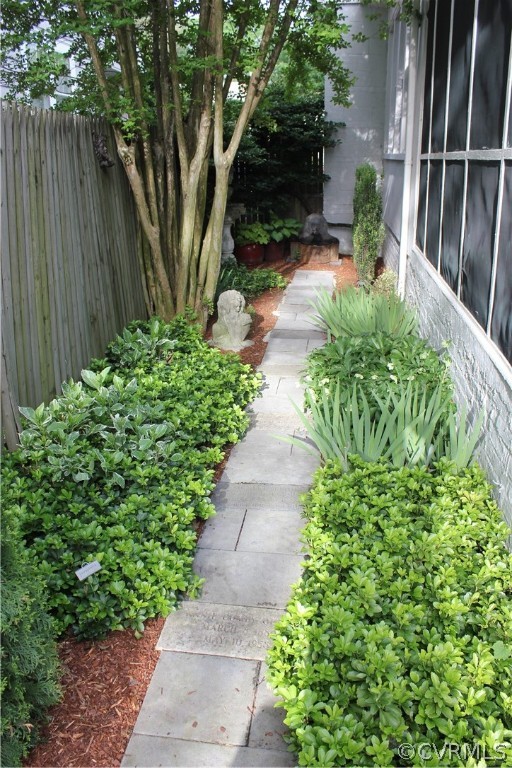 4227 Brook Road Richmond, VA 23227 - Photo 37 of 41 a view of a backyard with potted plants and large trees