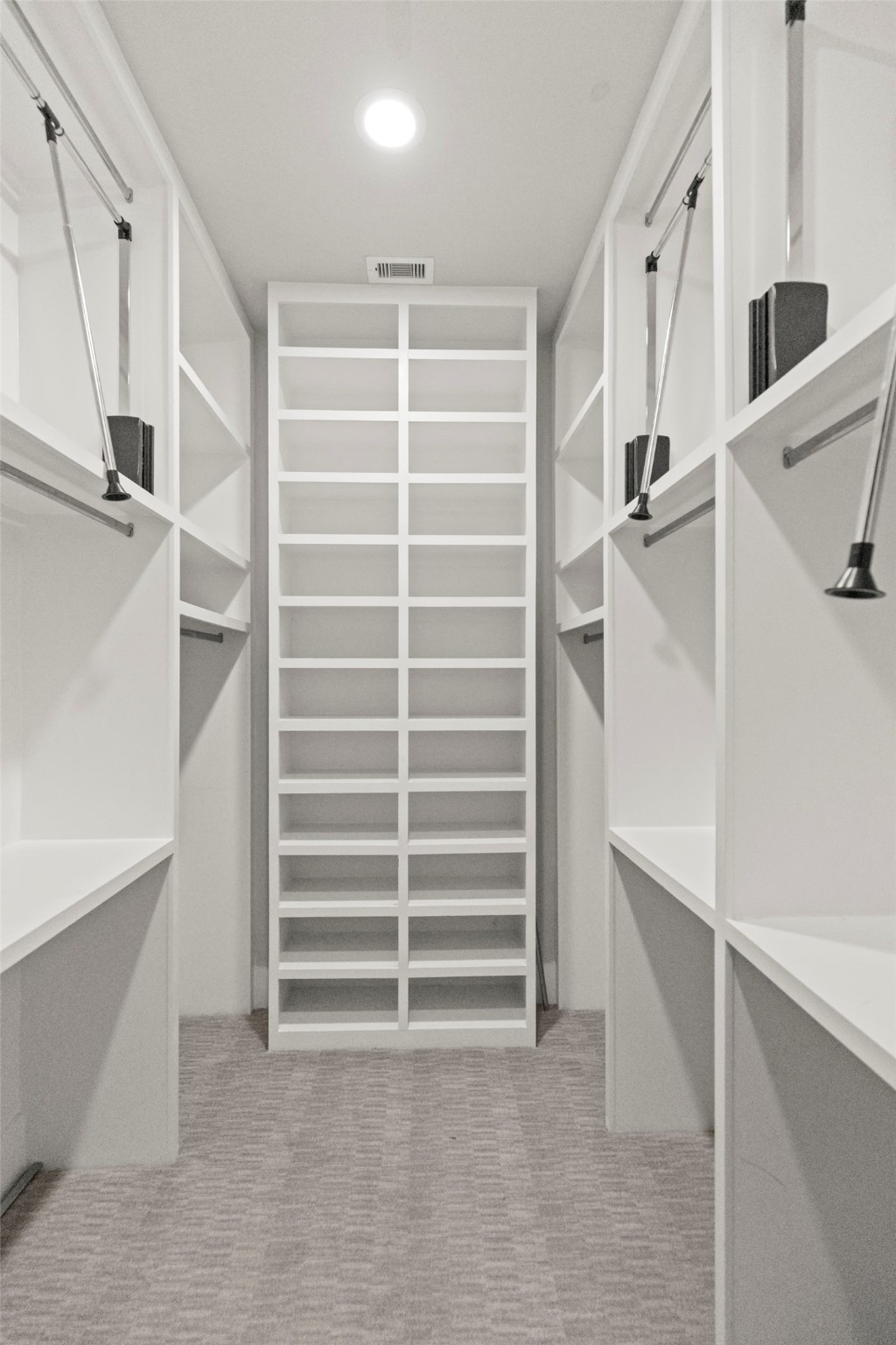 1613 Wheeler Avenue, Unit A Houston, TX 77004 - Photo 6 of 32 a view of walk in closet with empty racks