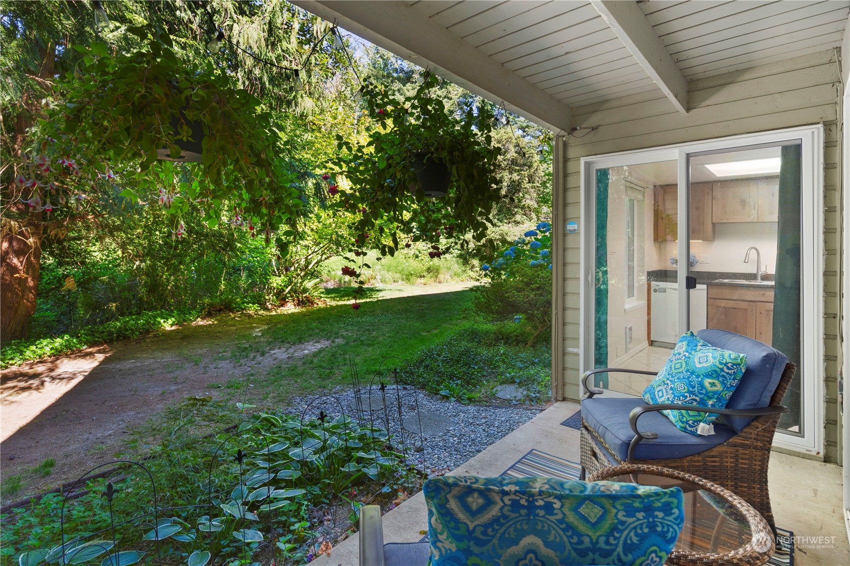 17522 151st Avenue Southeast, Unit 31 Renton, WA 98058 - Photo 12 of 37 a view of backyard with seating space and green space
