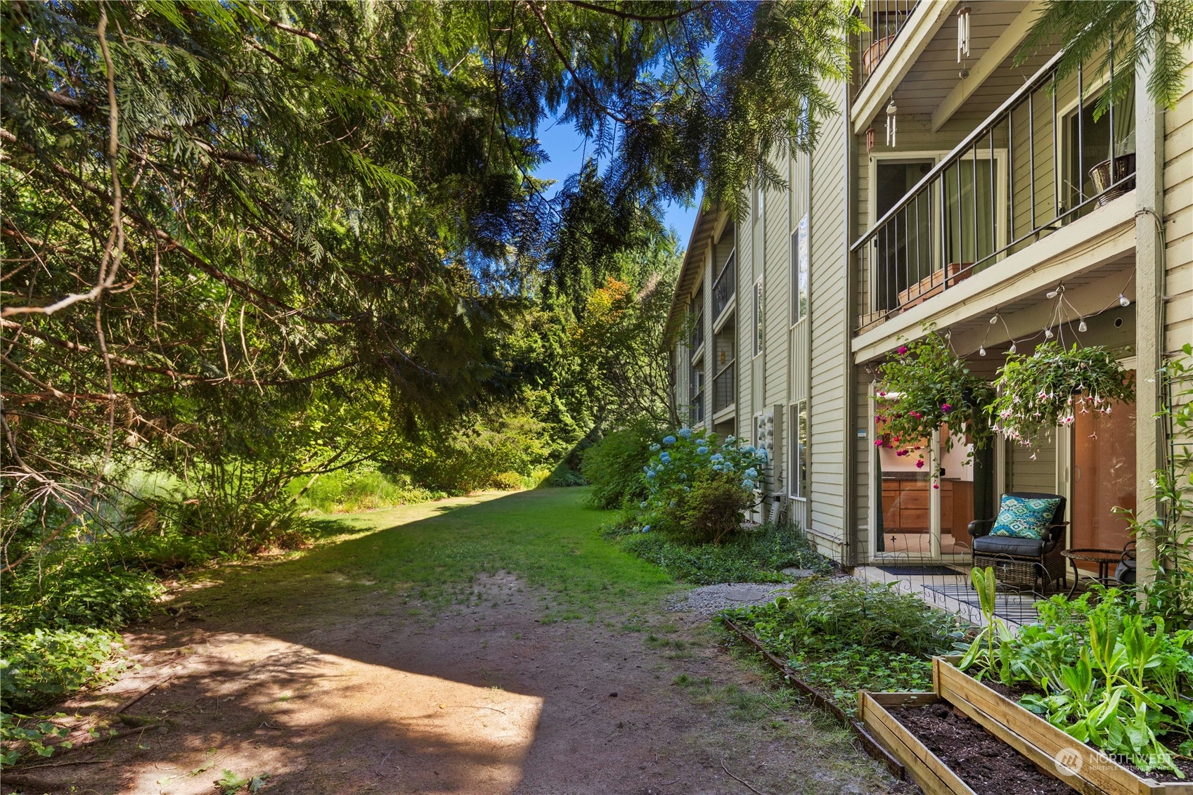 17522 151st Avenue Southeast, Unit 31 Renton, WA 98058 - Photo 13 of 37 a view of a house with a tree