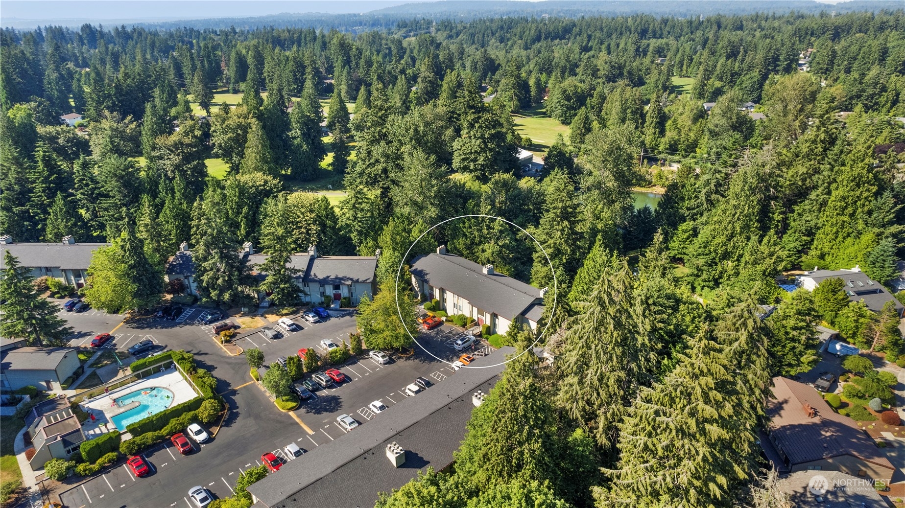17522 151st Avenue Southeast, Unit 31 Renton, WA 98058 - Photo 3 of 37 an aerial view of a house with a yard