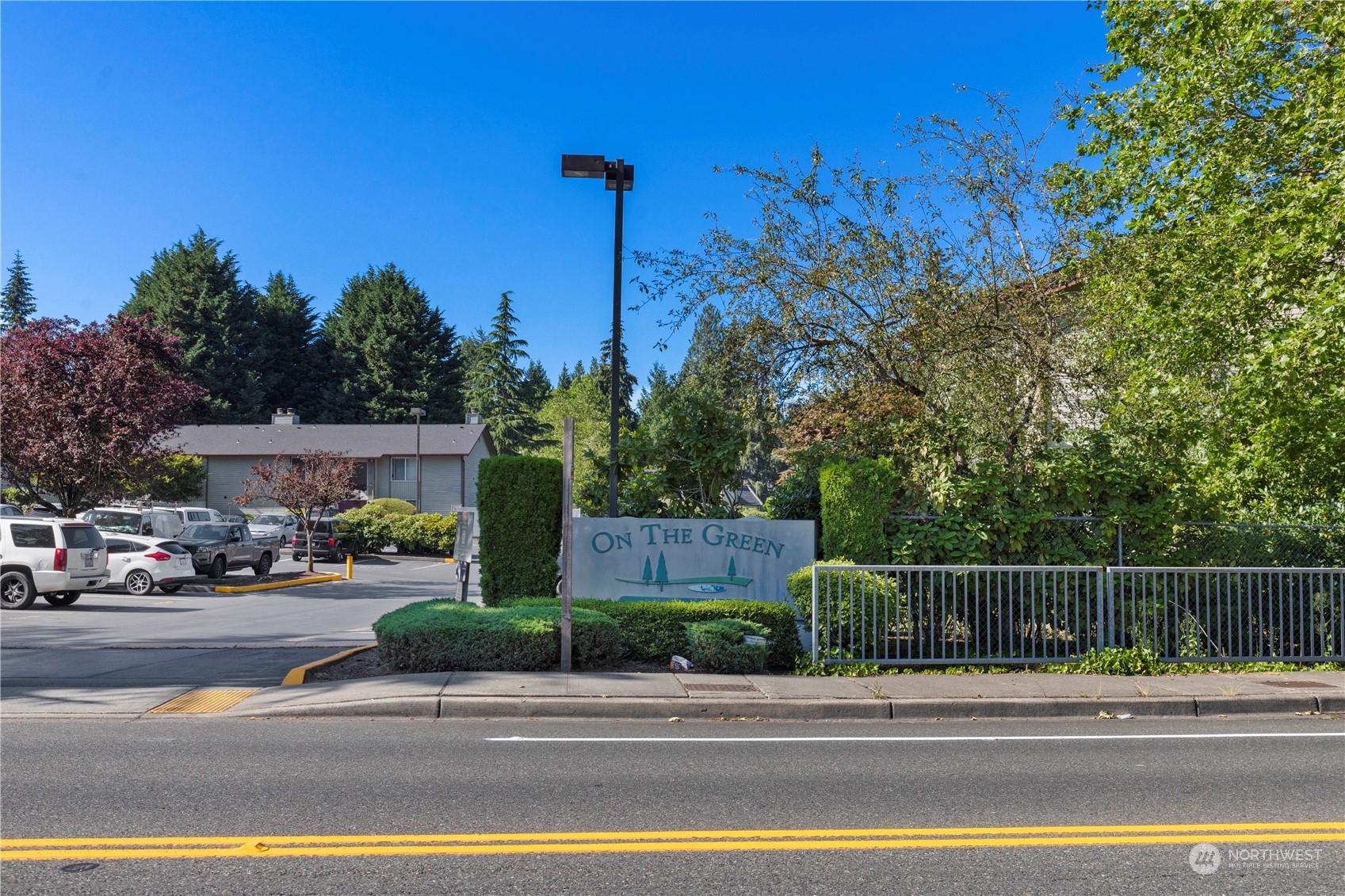 17522 151st Avenue Southeast, Unit 31 Renton, WA 98058 - Photo 34 of 37 a view of a street and a houses