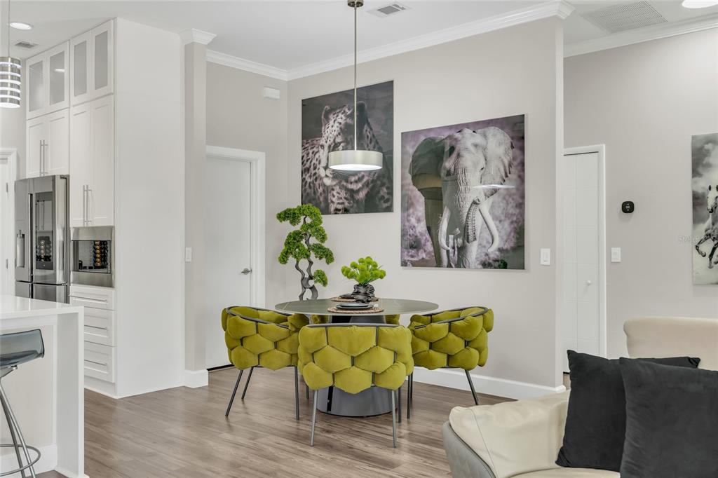 10600 Oakview Pointe Terrace Gotha, FL 34734 - Photo 13 of 44 a dining room with furniture and window